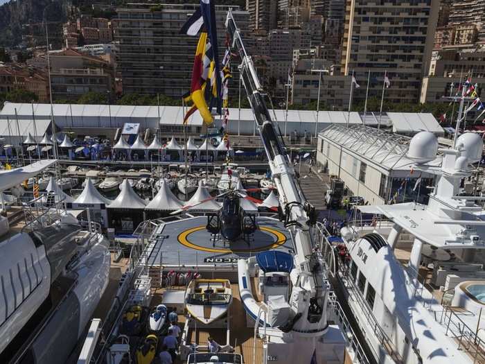 The support yacht also comes with the crane needed to lower the tenders from the yacht into the water. That makes the clunky hardware unnecessary on the mega yacht.