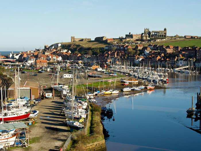 WHITBY HARBOR BEFORE: Whitby, in northern England, was once a busy fishing town that was packed with boats, fish-sellers, and tourists.