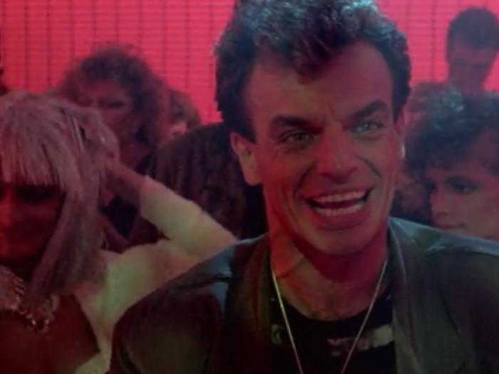 THEN: Ray Wise played gang member Leon Nash who gets dragged out of a club by RoboCop.