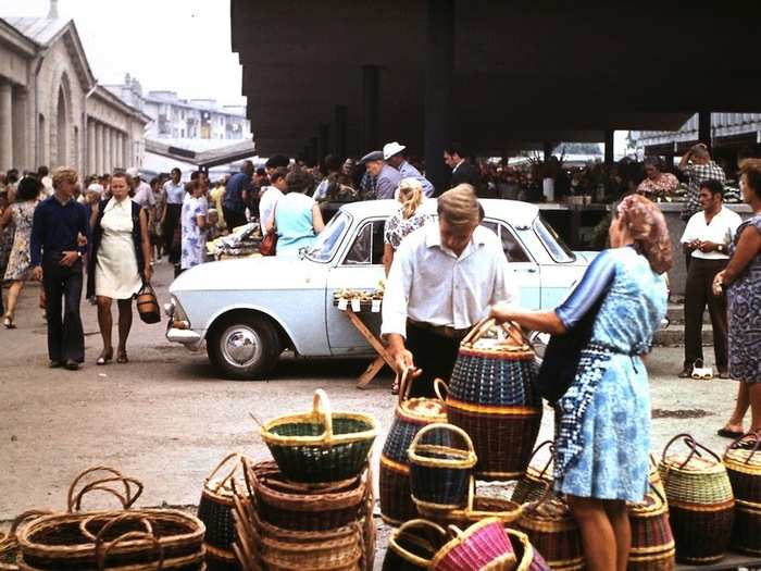 Potential customers examined some handmade baskets.