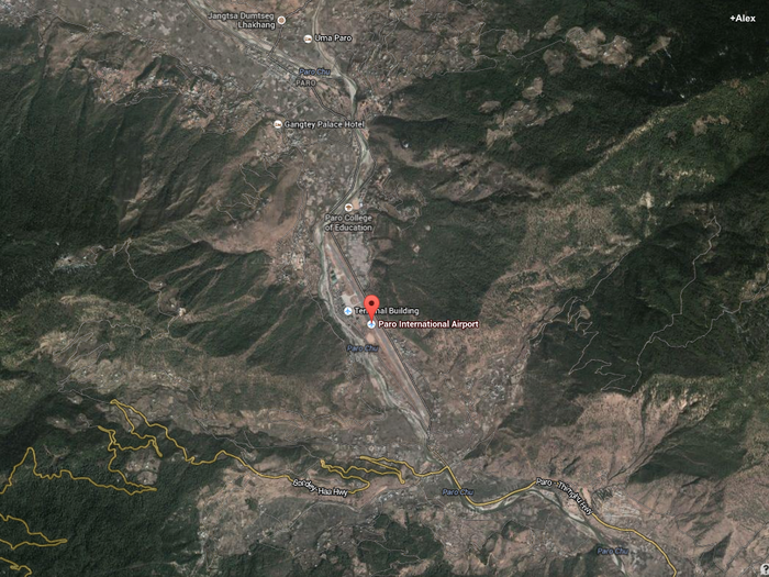 The Google Maps satellite view shows it is nestled among the Himalaya Mountains.