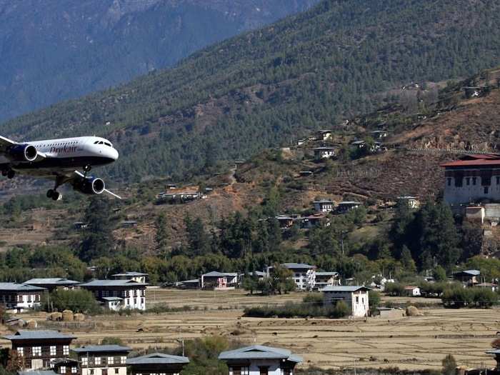 As they come in for landing, pilots must navigate a series of quick turns, to avoid the tall mountains and get in position to land on the short runway.