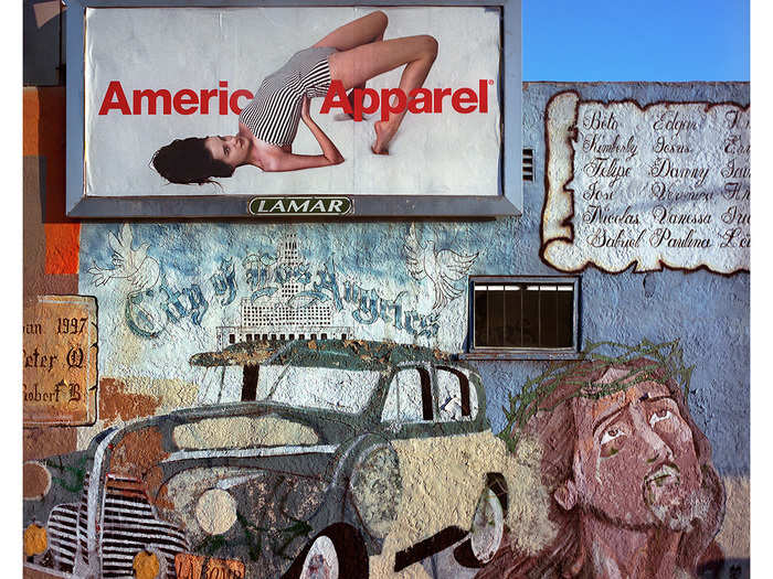 The ads can be seen throughout LA, though they tend to mass on the eastern half of the city. This photo was taken in a working class Latino area where religious murals painted on the side of a mom-and-pop stores dominate.