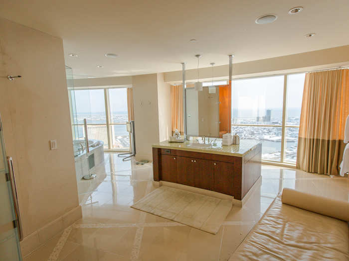 The bathroom of the master bedroom is equally large, with an island sink station in the center of the room.