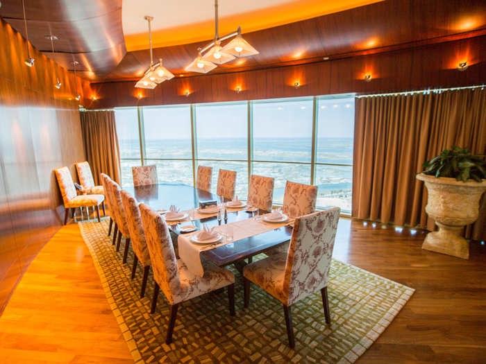 The suite has a large dining table that can seat 12.