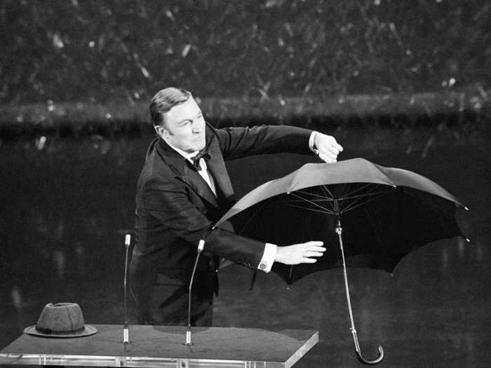 There were throwback gimmicks, too. Gene Kelly re-enacted one of the most iconic scenes in American cinema — doing a dance routine with an umbrella à la "Singing in the Rain" — while presenting the award for Best Original Song in 