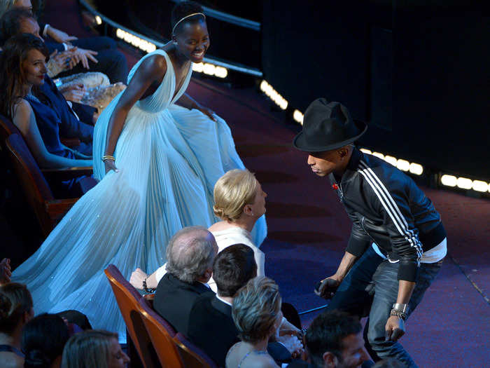 Pharrell danced to his Oscar-nominated song "Happy" along with Academy Award nominees Nyong