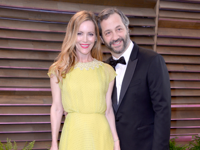 Director Judd Apatow and wife Leslie Mann brought some color to the rainy night.