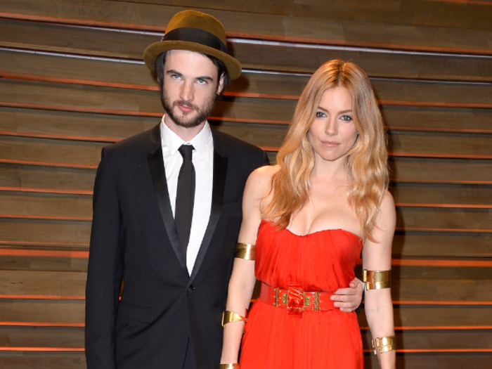 Sienna Miller and Tom Sturridge looked thrilled to be there.