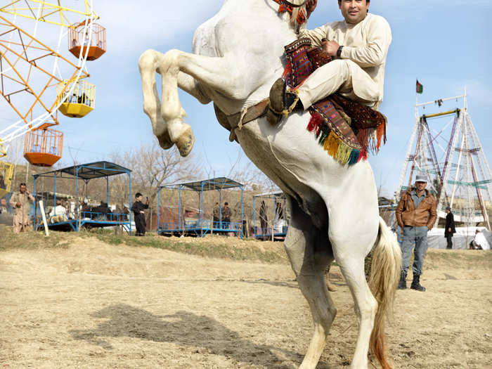 This man loves Ghargha Lake because residents rent horses and ride along the beach. Each rider tries to outdo the other by making his or her horse rear.