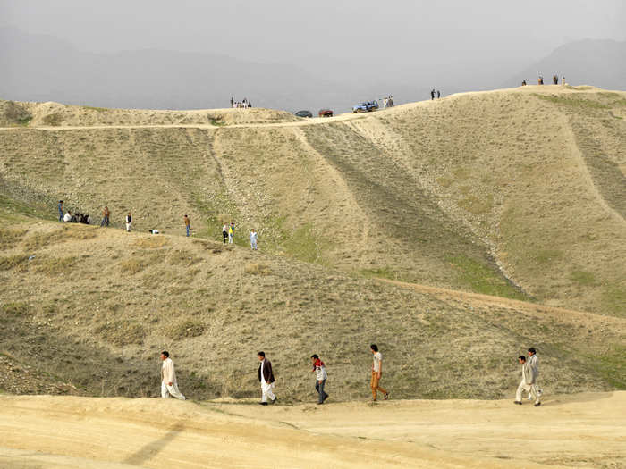 These boys love to test their cars and mopeds in the mountains close to Kabul, where they can drift and drive at high speeds up the mountain.