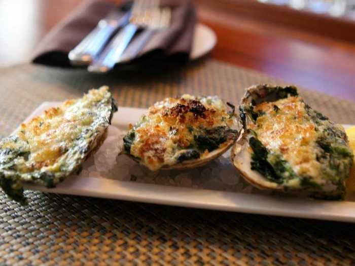 Oysters Rockefeller: Oysters baked in their shells with herbs, breadcrumbs, and lots of butter. First made in 1899 at Antoine