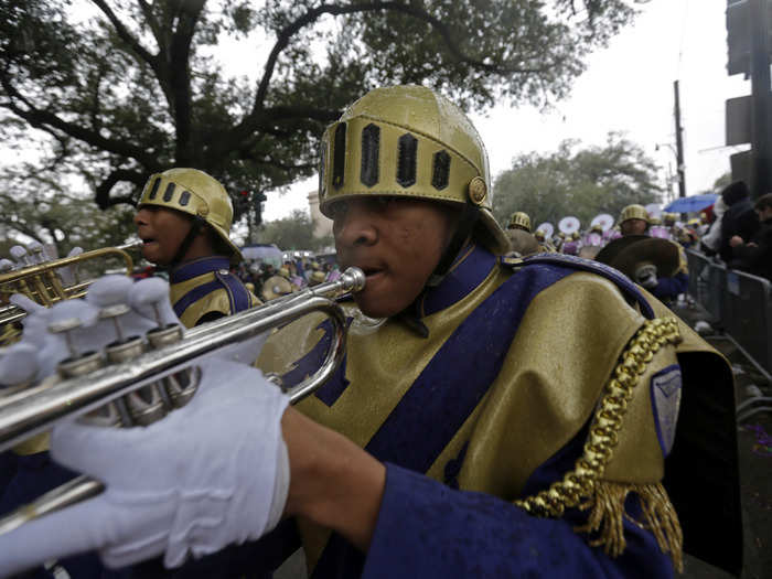 The St. Augustine High School marching band had 100 members perform in the Krewe of Zulu parade during Mardi Gras.