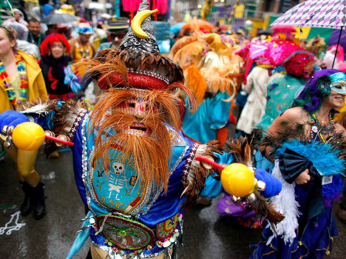 Whole parades are designed around masquerade masks like the Mondo Kayo Social Marching Club parade.