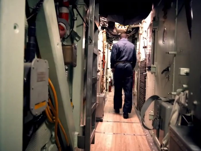 Of course, most areas on the submarine are cramped. Hallways are absolutely no exception to that.