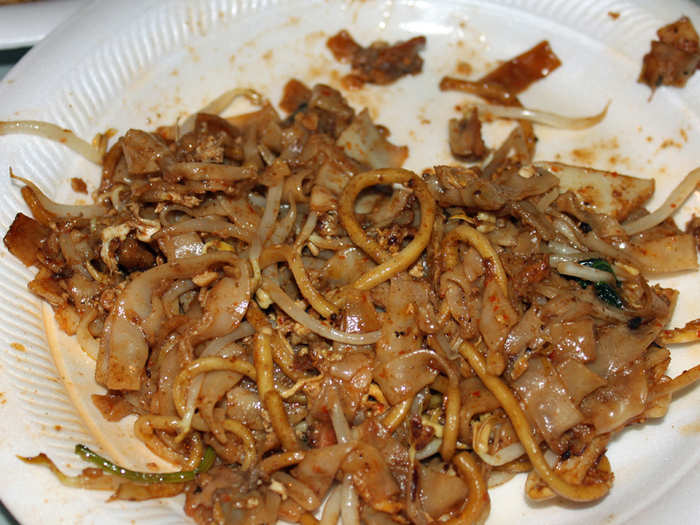 Char kway teow is another iconic Singaporean dish. It