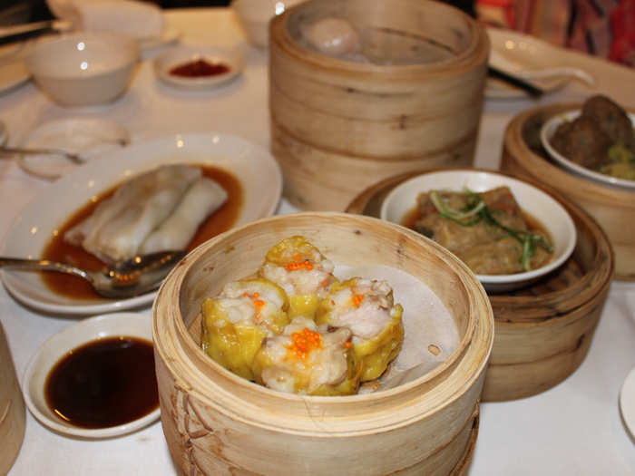 Dim sum is an extremely popular meal in Singapore. People gorge themselves on all sorts of Chinese dumplings and snacks, like these shrimp and pork dumplings.