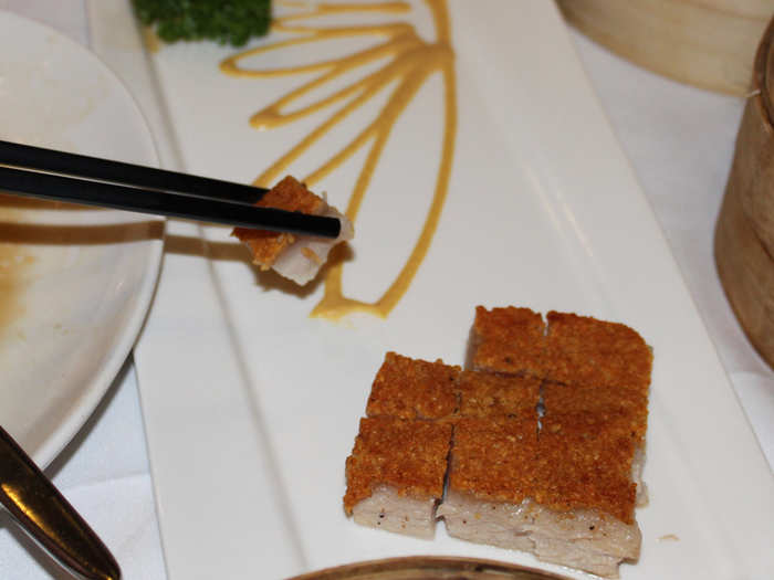 This roast pork, from Crystal Jade Palace Restaurant, is crunchy and crispy on top and fatty and delicious on the bottom.