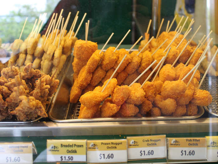 You can get fried fish and prawns on a stick.