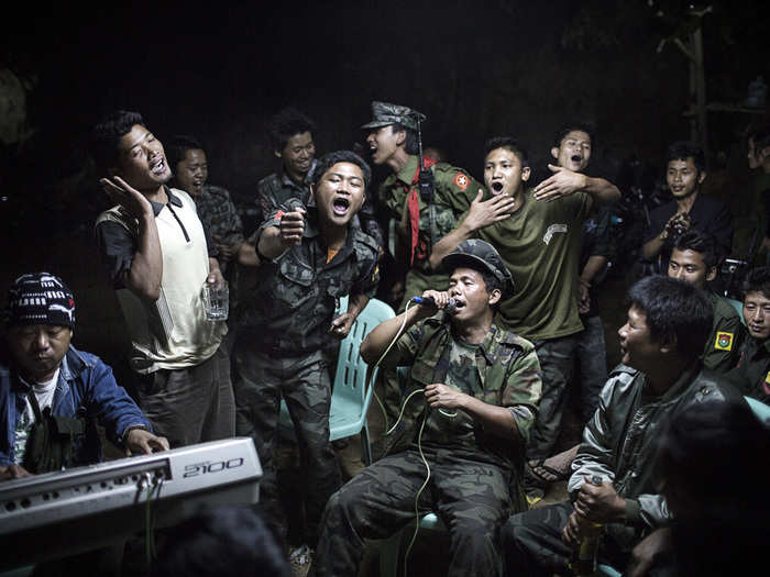 In Northern Burma, the Kachin Independence Army has carried on a civil war with the Burmese government for the better part of the last 50 years. Here, Kachin fighters drink and celebrate at the funeral of one of their commanders.