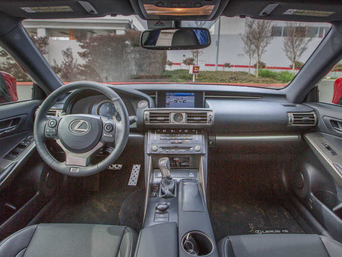 The front seats have plenty of room. The dash is a bit intimidating at first — there seem to be buttons, knobs, and touchscreens on every surface.