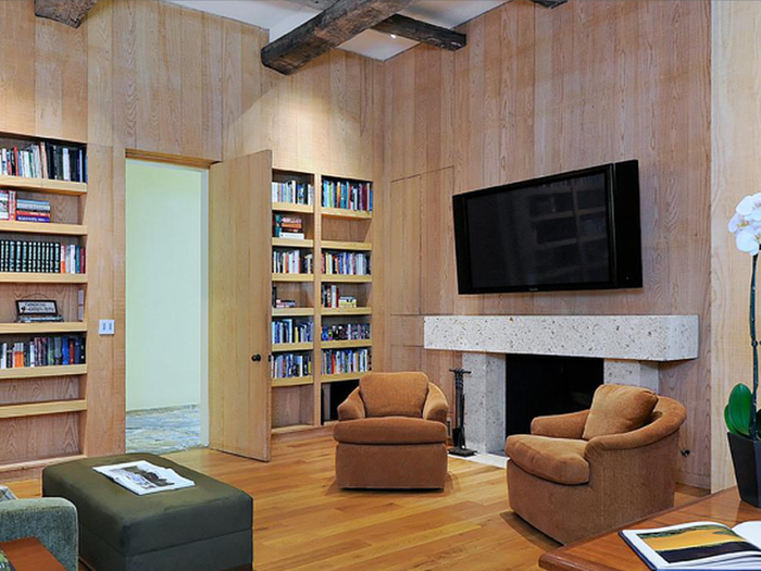 The office comes with built-in bookcases.