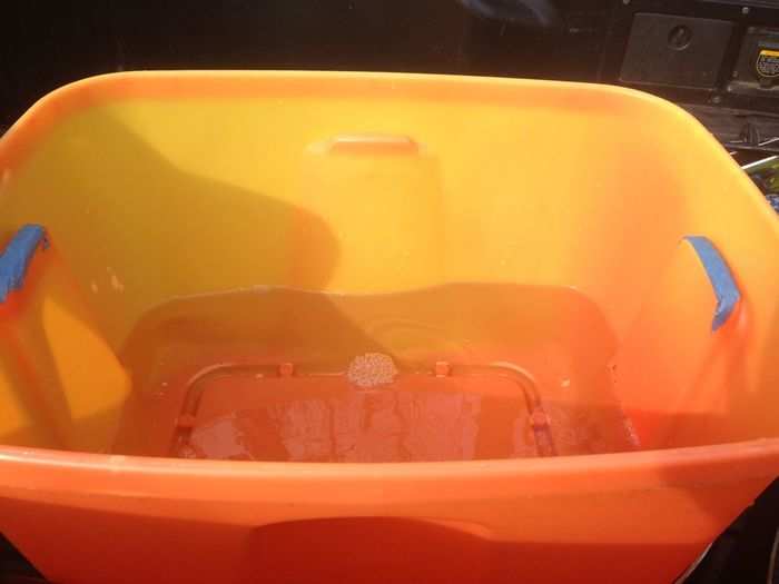 We dump our buckets into a plastic tub in the truck.