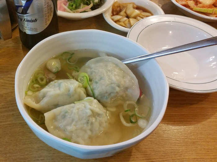 I stopped inside one random restaurant for dumpling soup and a Cass, a local Korean beer.