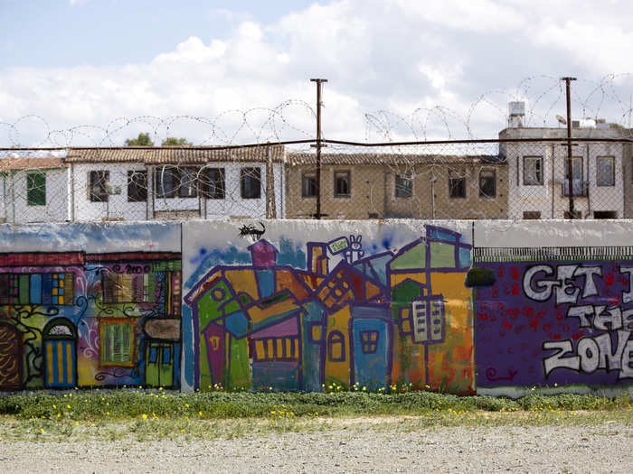 Both Turkish and Greek Cypriots are barred from entering the buffer zone, so their experience is limited to seeing it from outside.