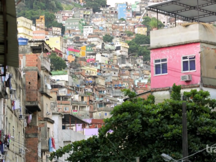 On the second day, Tony tours the the Favela of Rocinha. While the Brazilian slums have reputations as shantytowns governed by drug lords, he learns that electricity and water have been installed and a police presence has helped clean up the streets.