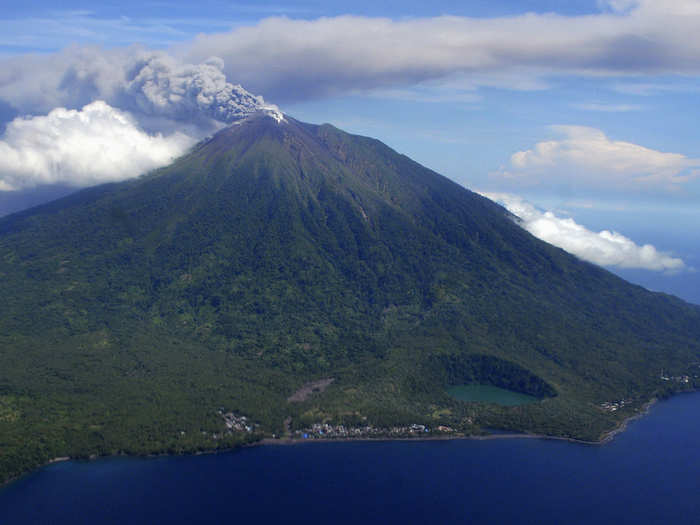 An aerial view of Mount Gamalama as it spews volcanic ash after it erupted at the Indonesia