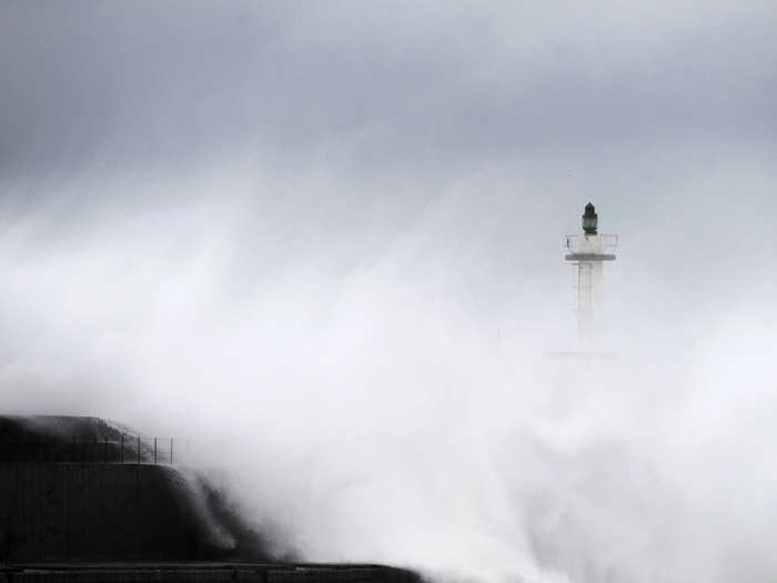 Huge waves crash onto San Esteban de Pravia seafront in the northern Spanish region of Asturias.