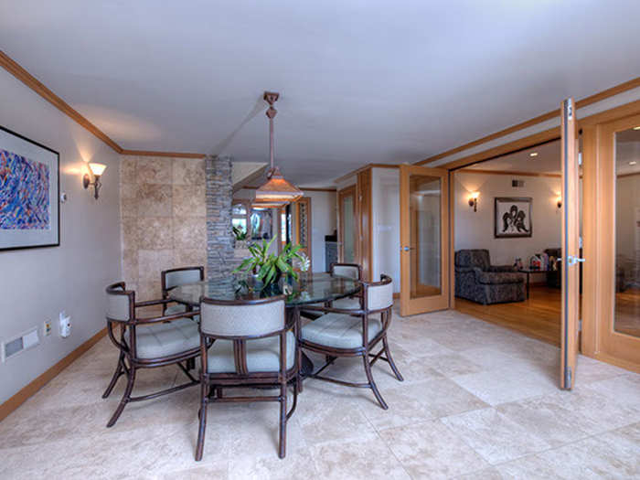 This house has plenty of options for entertaining guests, like this downstairs sitting area.