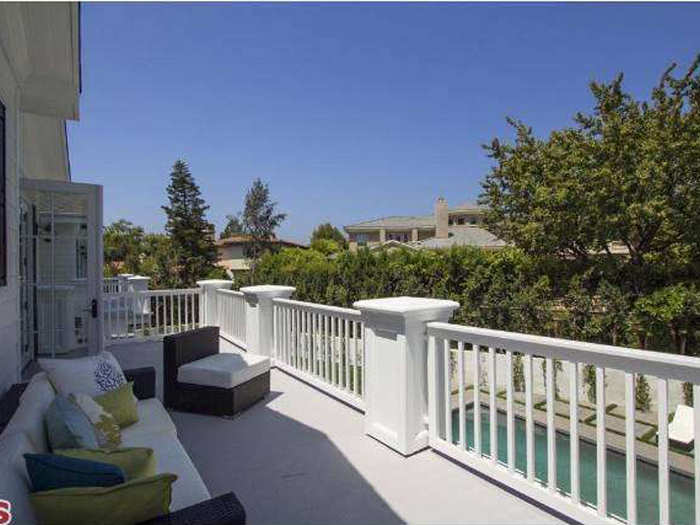 The porch overlooking the salt water pool