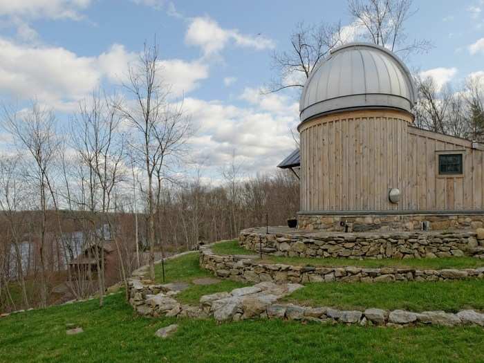 Outside is a barn, a regulation-size tennis court, as well as a stargazing observatory with a professional grade Meade telescope.