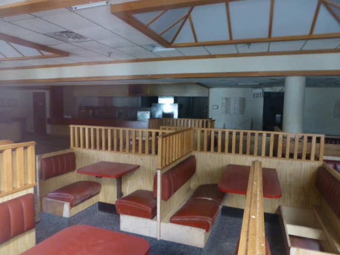 The seats are torn and dusty inside this former Beef Corral, which was more recently an Arby