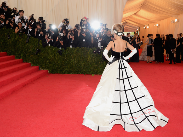 Her Oscar de la Renta dress impressed from the back.