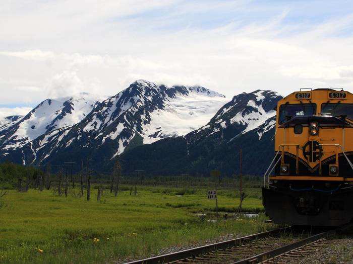 The train is known for its glass-domed rail cars, which are excellent for viewing the stunning mountains and landscapes that the train passes.