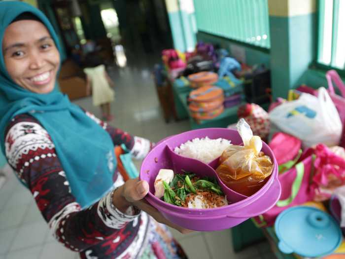 JAKARTA, INDONESIA: Rice, meatball soup, tofu, and vegetables.