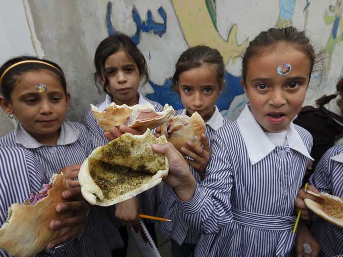 NABLUS, WEST BANK: Sandwiches brought from home consist of pita bread stuffed with olive oil and zaatar, a mixture of herbs and spices.