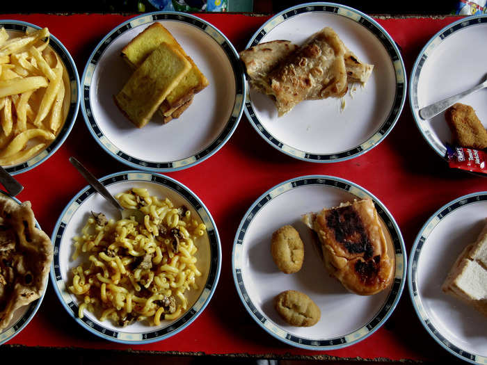 RAWALPINDI, PAKISTAN: More lunch plates on display. “If we discover that a child has junk food, we ask his or her parents to please make a little effort for their child’s health,” says the school