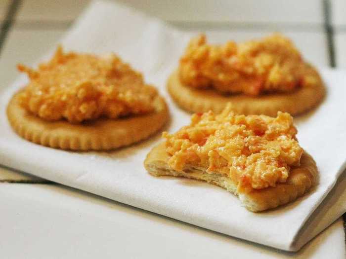 GEORGIA: Pimento cheese, dubbed “caviar of the South,” is a mixture of pimentos, cheddar cheese, mayo, and spices, and is staple on the menu at annual The Masters golf tournament at Augusta National.