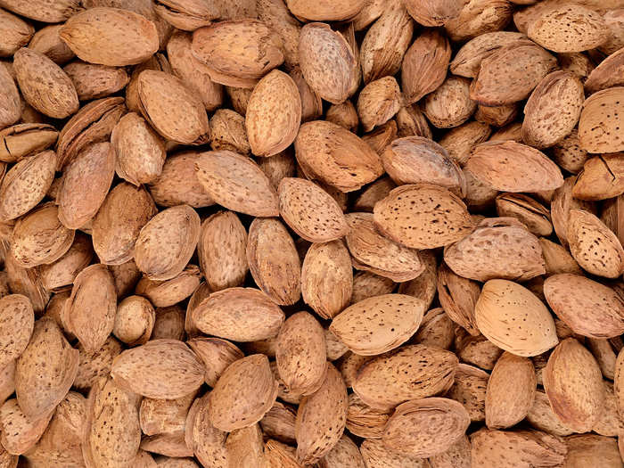 Additionally, almond hulls, or shells, are often ground up and used as feed for cows.