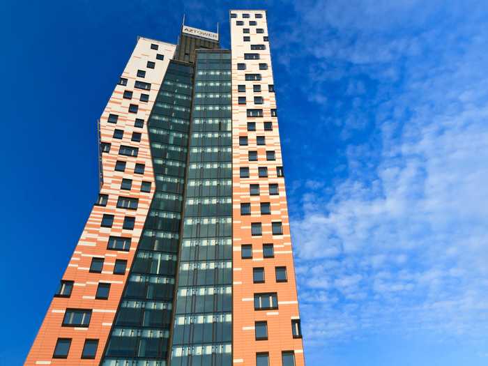 #9 AZ TOWER — Located in downtown Brno, Czech Republic, the AZ Tower houses office, retail, and residential spaces. The speckled orange and white facade makes the building stand out in the city