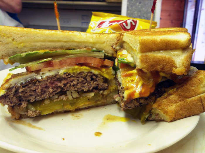 MAINE: Halfway between Portland and Bar Harbor, the Owls Head General Store is famous for its epic Seven Napkin Burger. Loosely packed and severely juicy, you