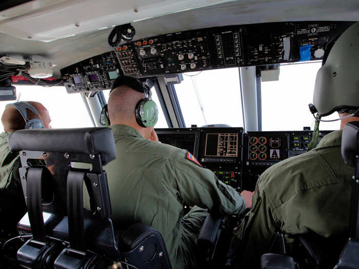 All the chatter between the navigator, co-pilot, and pilot starts coming through those green headphones.