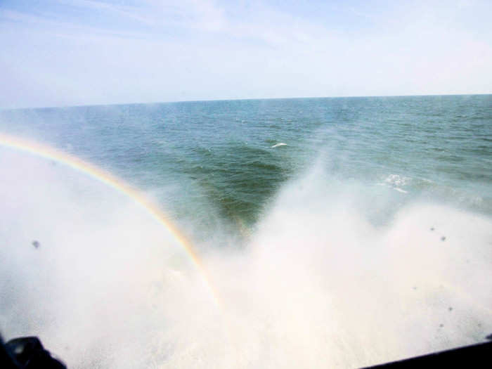 Pulling a 180-degree turn throws up another blast of spray and we speed back toward shore.