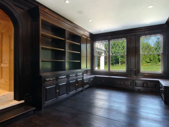 The architect paid attention to every detail. The library downstairs is paneled in black walnut.