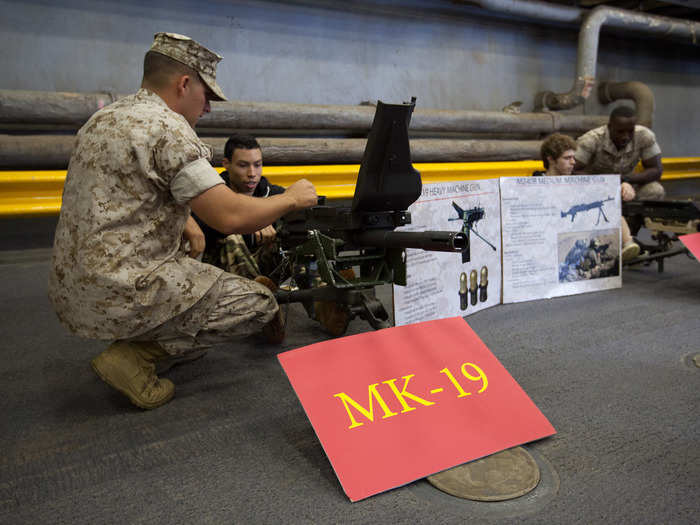 First, we get a demonstration of the different machine guns that the Marines and Navy sailors have onboard. The Mark-19 is an automatic grenade launcher mounted on a tripod. It has been in service since the Vietnam War.