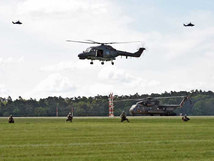 A German Navy Westland Lynx dropped off its cargo of troops.